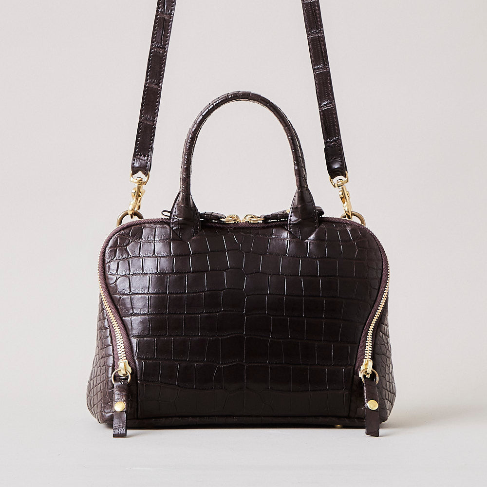 motion mini / co21ssmm040 / crocodile leather – cornelian taurus